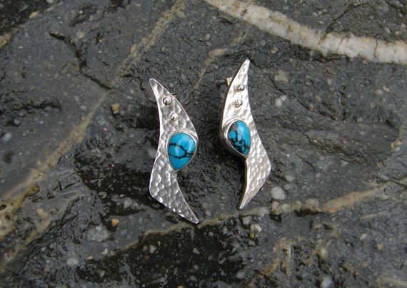 'Fishtail Earrings - Hammered Stirling Silver with Gradulation Detail and Turquoise' by artist Marley McKinnie